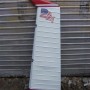 185 rudder White and red rudder with an American flag on it.